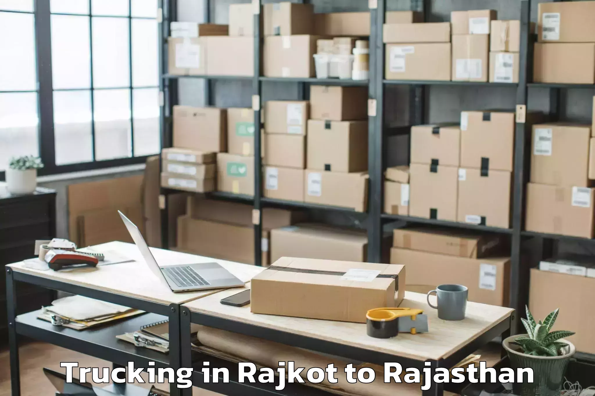 Quality Rajkot to Rajasthan University Of Health Trucking